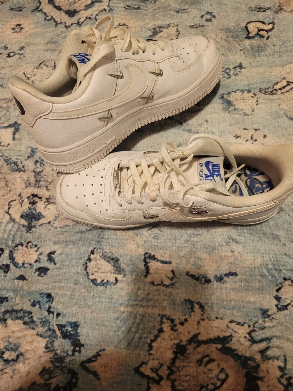 Nike Air Force 1 White Sneakers with Blue Logo